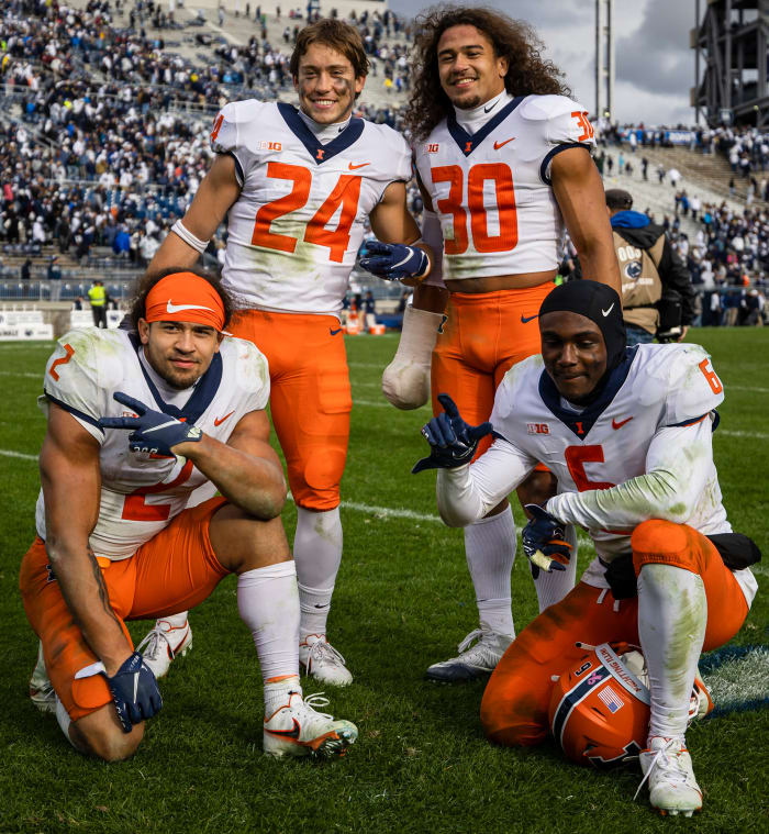 Chase (wearing No. 2) and Sydney (No. 30) with Illinois teammates.